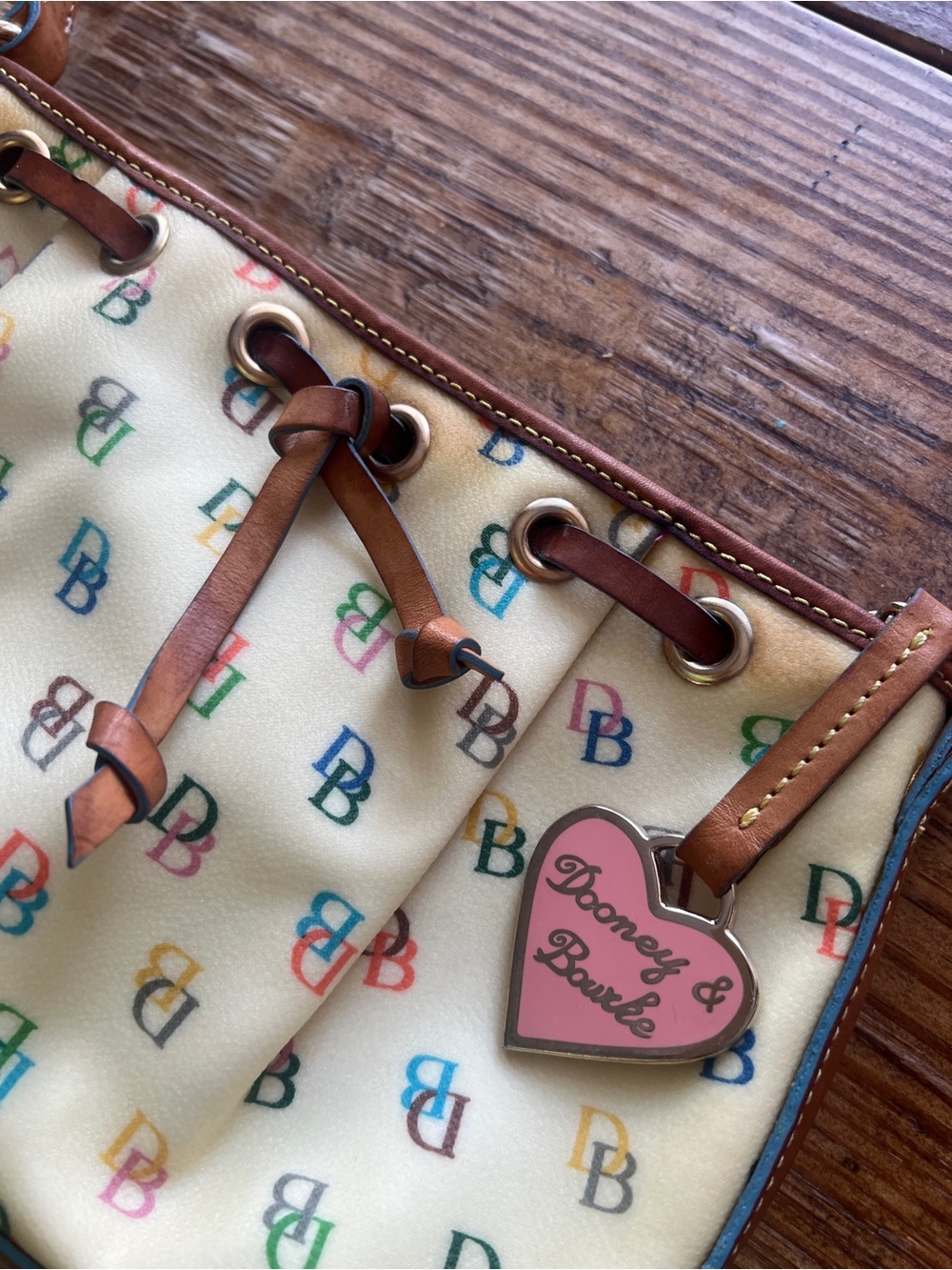 Dooney & Bourke Cream Multicolor DB Logo Drawstring Shoulder Bag - Picture 8 of 11